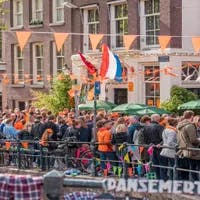 Koningsdag or King's Day is a national holiday in the Kingdom of the Netherlands. Celebrated on 27 April, the date marks the birth of King Willem-Alexander. 

Celebrations: Partying, wearing orange costumes, and traditional local gatherings.