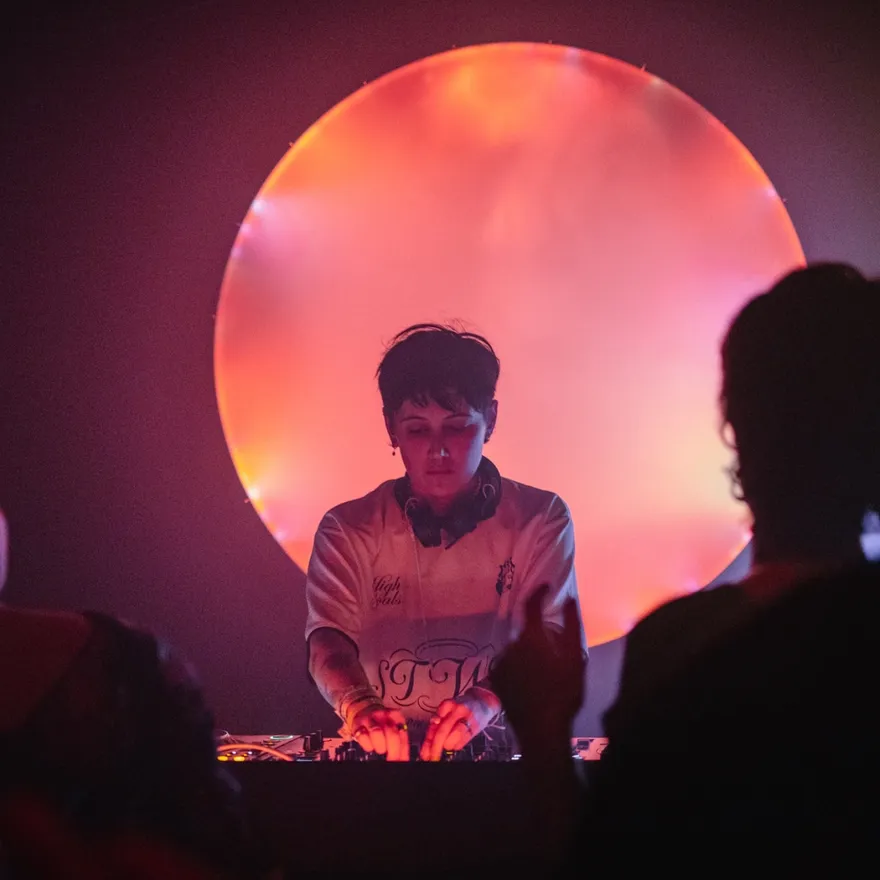 Radio Radio DJ playing music and people dancing