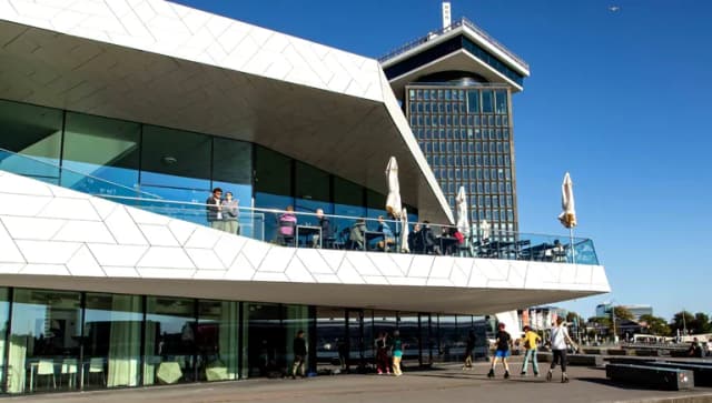 Eye Filmmuseum exterior and terrace with A'DAM Tower in the background