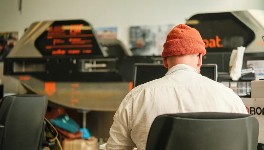 Person working on a computer at Roboat offices