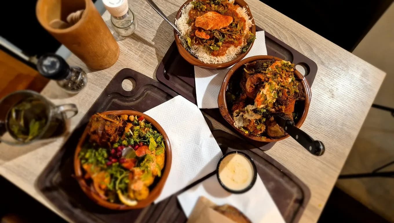 Dishes at Hawawshi Egyptian streetfood restaurant on Kinkerstraat