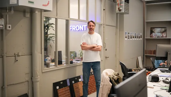 Ward Massa, CEO and co-founder of FRONT, standing in his office in Amsterdam.