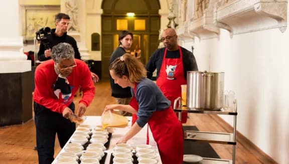 People pouring Vrijheidssoep during the Vrijheidsmaaltijden on 5 mei, may 5th, liberation day meals, bevrijdingsdag.