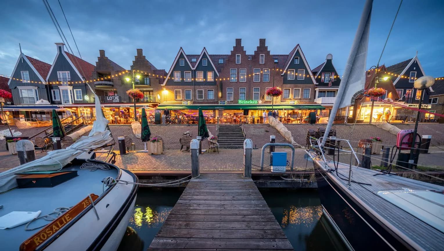 De Dijk at night in Volendam seen from the harbour.