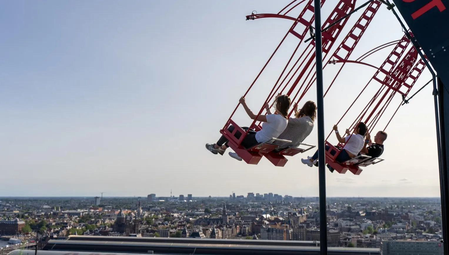 People on the  / ADAM Lookout / swings