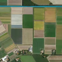 colorful fields bird's eye view, land consolidation and cultivated fields looking down aerial view from above, Amsterdam, Netherlands