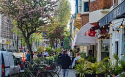Busy street with ice cream parlour