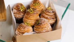 Pastries in a box at SAINT-JEAN bakery.