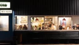 FC Hyena cinema restaurant exterior at night