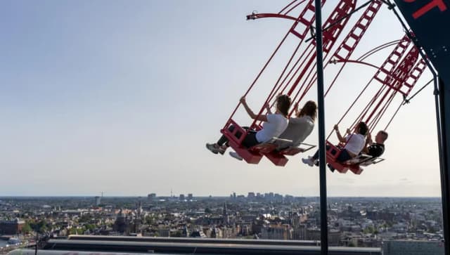 People on the  / ADAM Lookout / swings