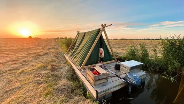 woman staying the night in a tent