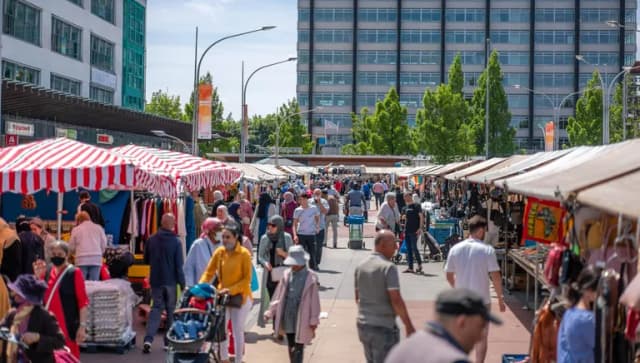 People shopping at market