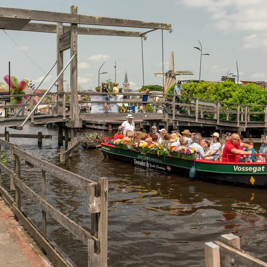 People on a boat tour on the Westeinderplassen lakes near Aalsmeer.
