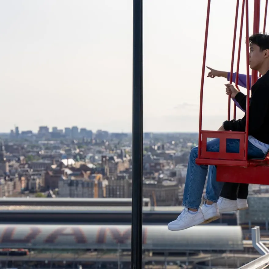 People on the  / ADAM Lookout / swings