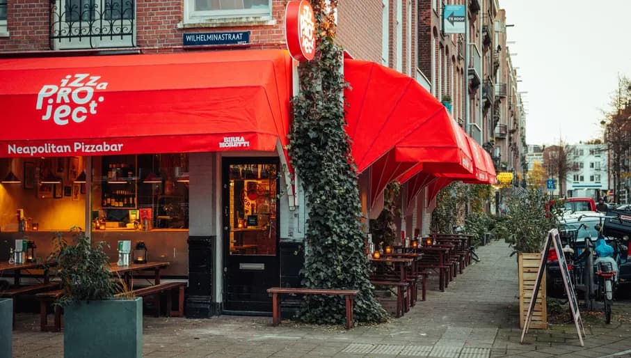 Pizza Project exterior and terrace during the day