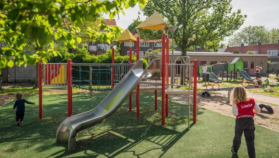 Kids play on a children's playground in Haarlem.