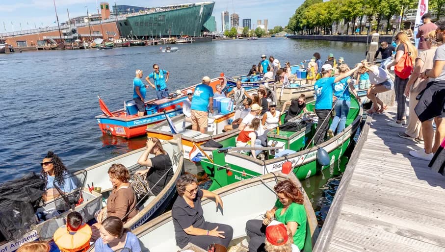 Plastic Whale boat with volunteers