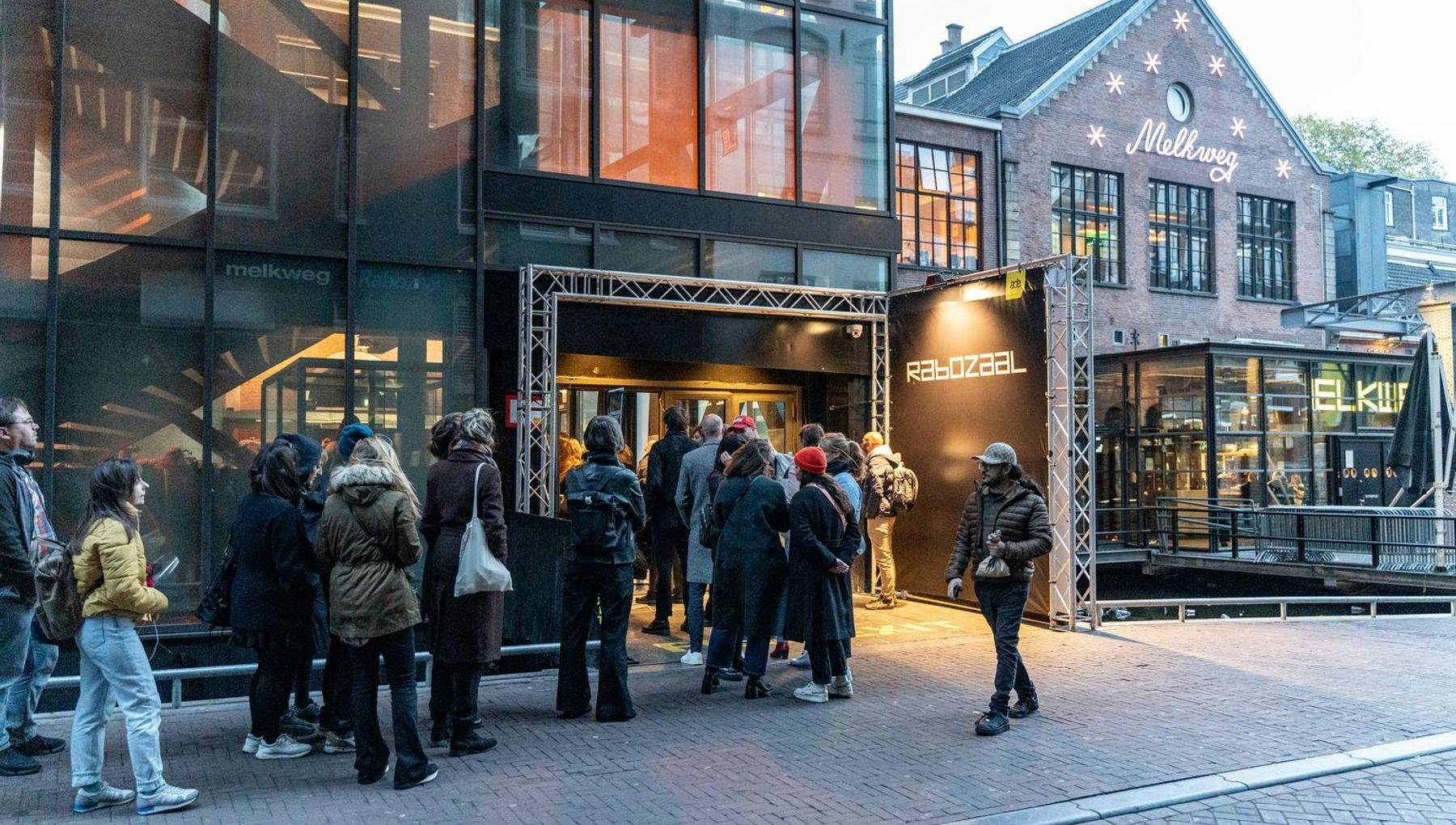 People in line for the Melkweg Rabozaal during Amsterdam Dance Event (ADE) 2022.