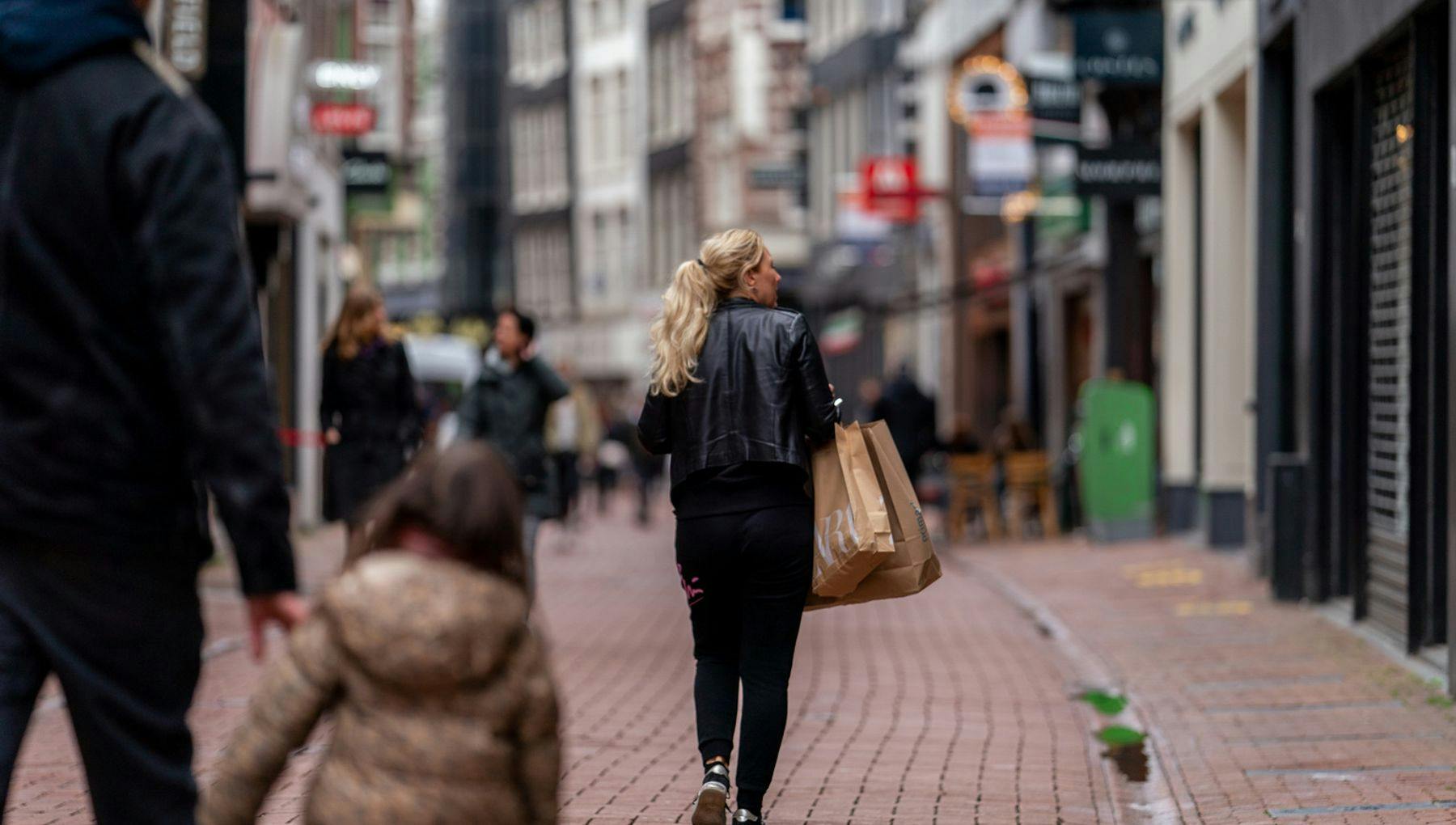People shopping at Kalverstraat. These pictures can be used by editors at amsterdam&partners at royalty free basis.