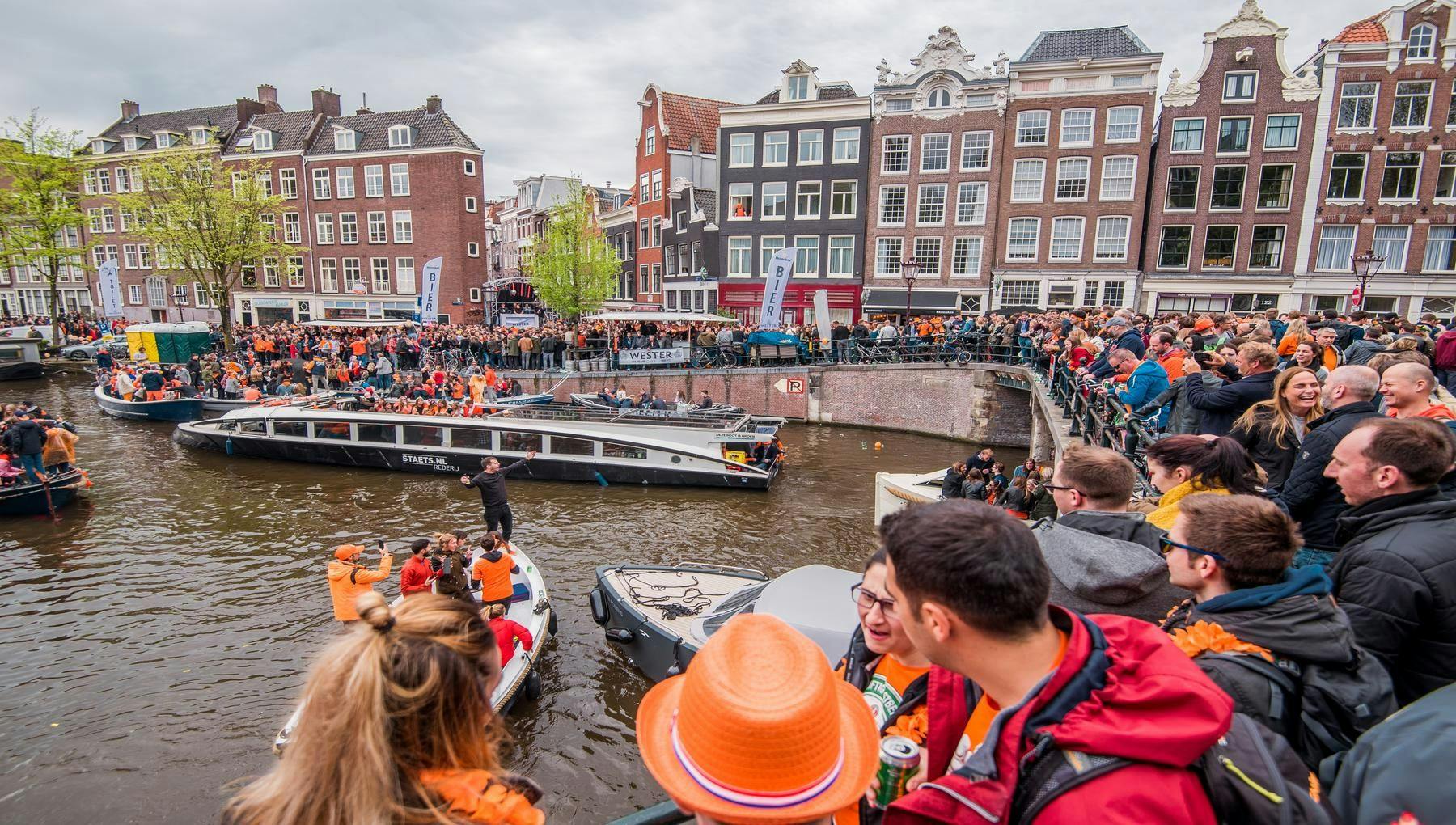 Koningsdag or King's Day is a national holiday in the Kingdom of the Netherlands. Celebrated on 27 April, the date marks the birth of King Willem-Alexander. 

Celebrations: Partying, wearing orange costumes, and traditional local gatherings.