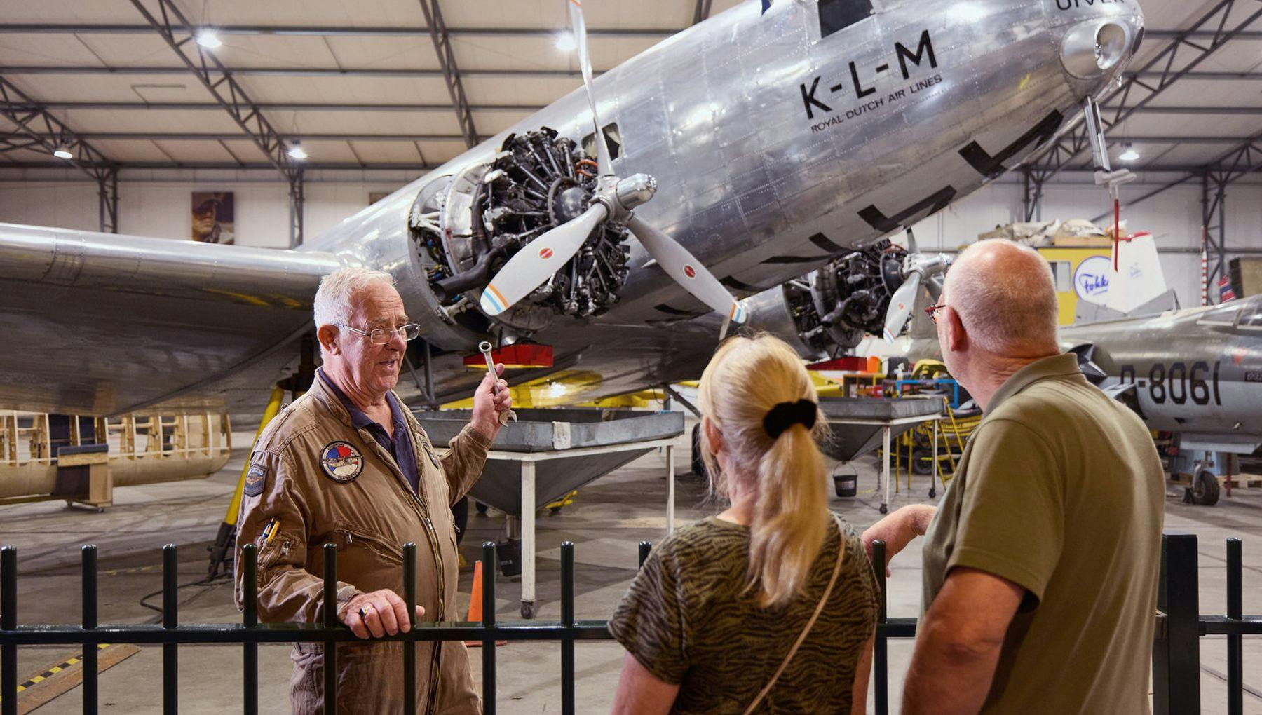 Adults looking at an exhibit at Aviodrome Museum in Lelystad