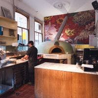Chef in La Perla pizza kitchen