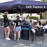 People enjoying themselves at the nice terrace of Café Toeters en Bellen in Weesp