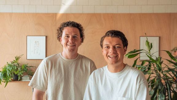 Portrait of Plekky co-founders Tom Remy and Casper Noordhuizen in their office.