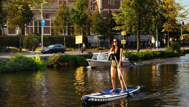 Canal SUP Amsterdam Stand Up Paddleboard supping on the canal