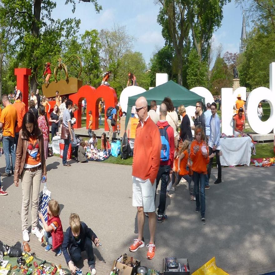 Koningsdag or King's Day is a national holiday in the Kingdom of the Netherlands. Celebrated on 27 April, the date marks the birth of King Willem-Alexander. 

Celebrations: Partying, wearing orange costumes, flea markets, concerts, and traditional local gatherings.