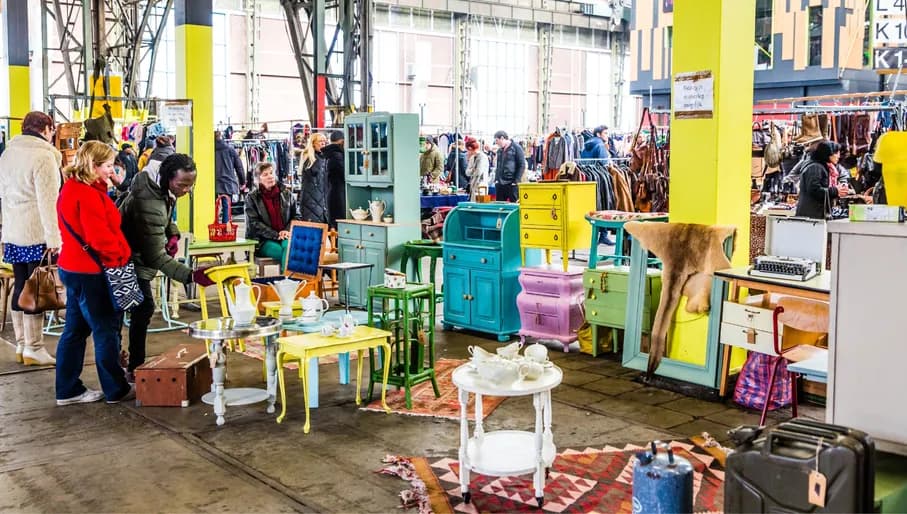 People walking around the IJ-Hallen