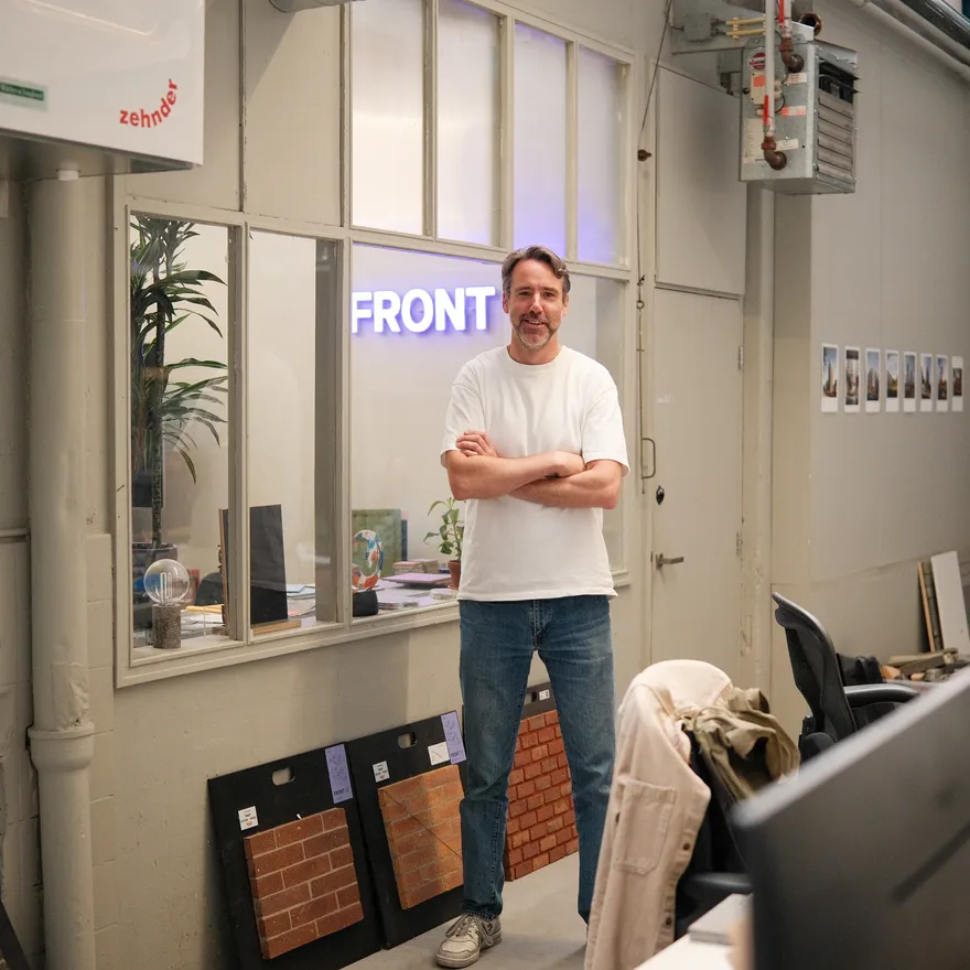 Ward Massa, CEO and co-founder of FRONT, standing in his office in Amsterdam.