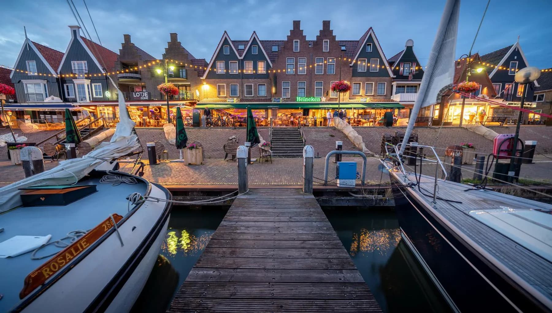 De Dijk at night in Volendam seen from the harbour.