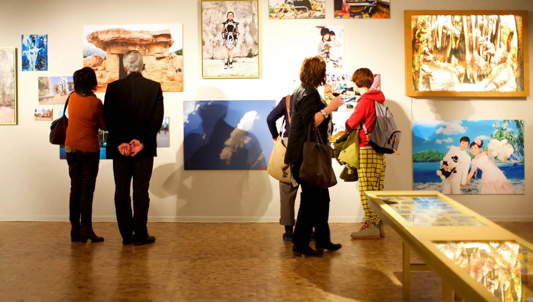 People looking at art