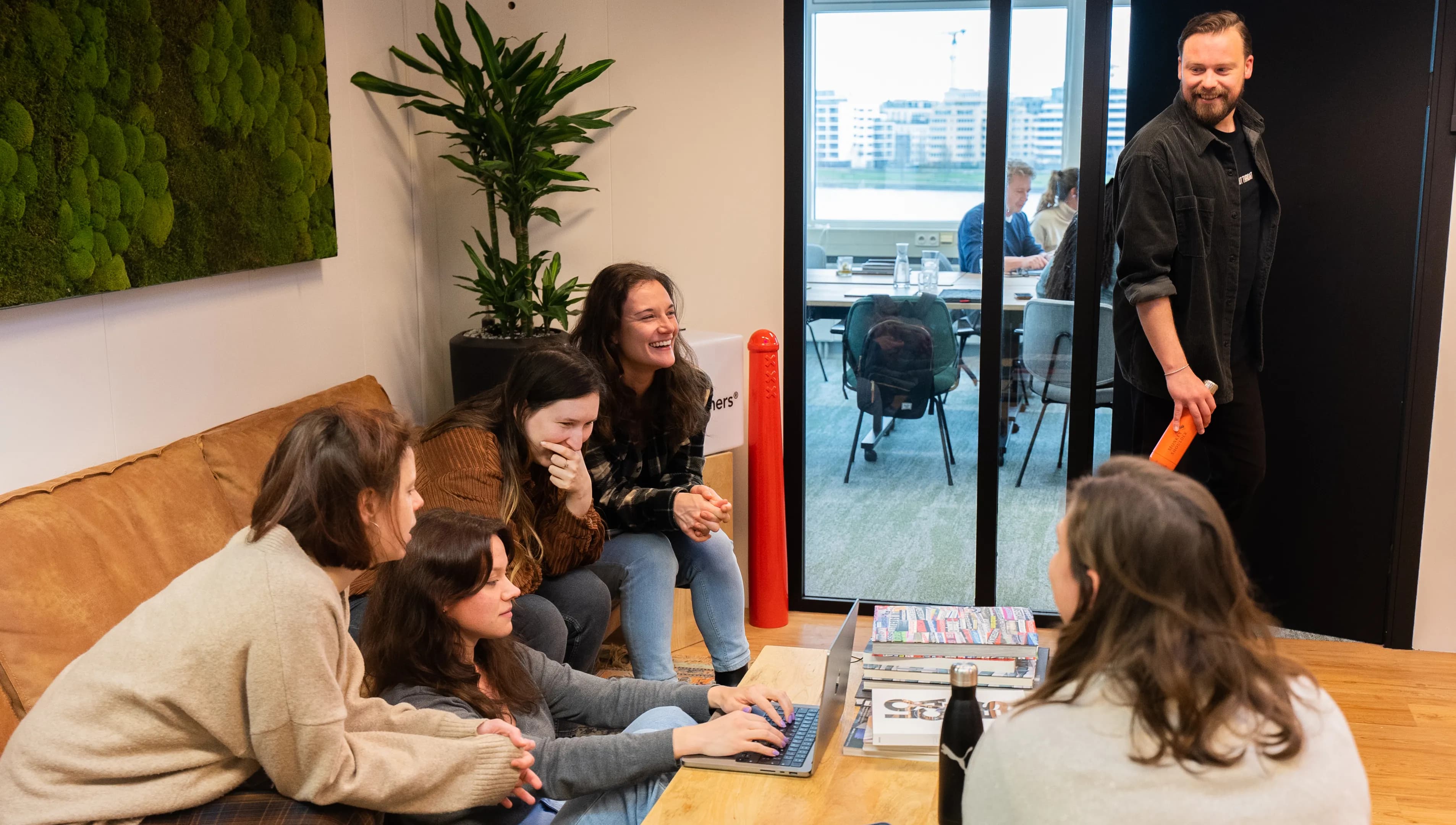 Colleagues working together in the office