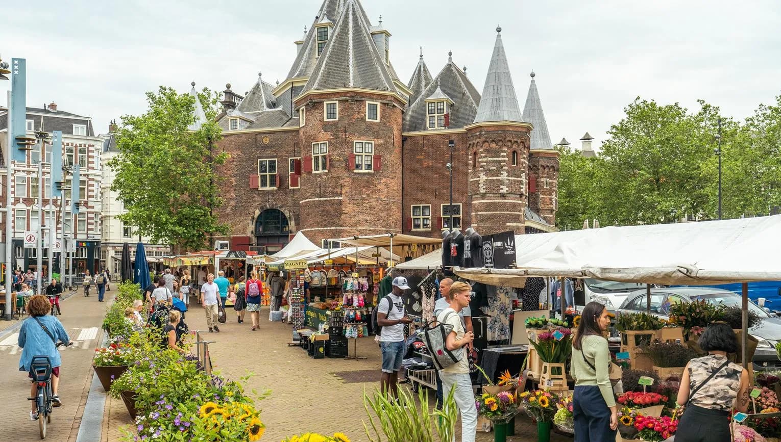 Nieuwmarkt market flower stalls and De Waag