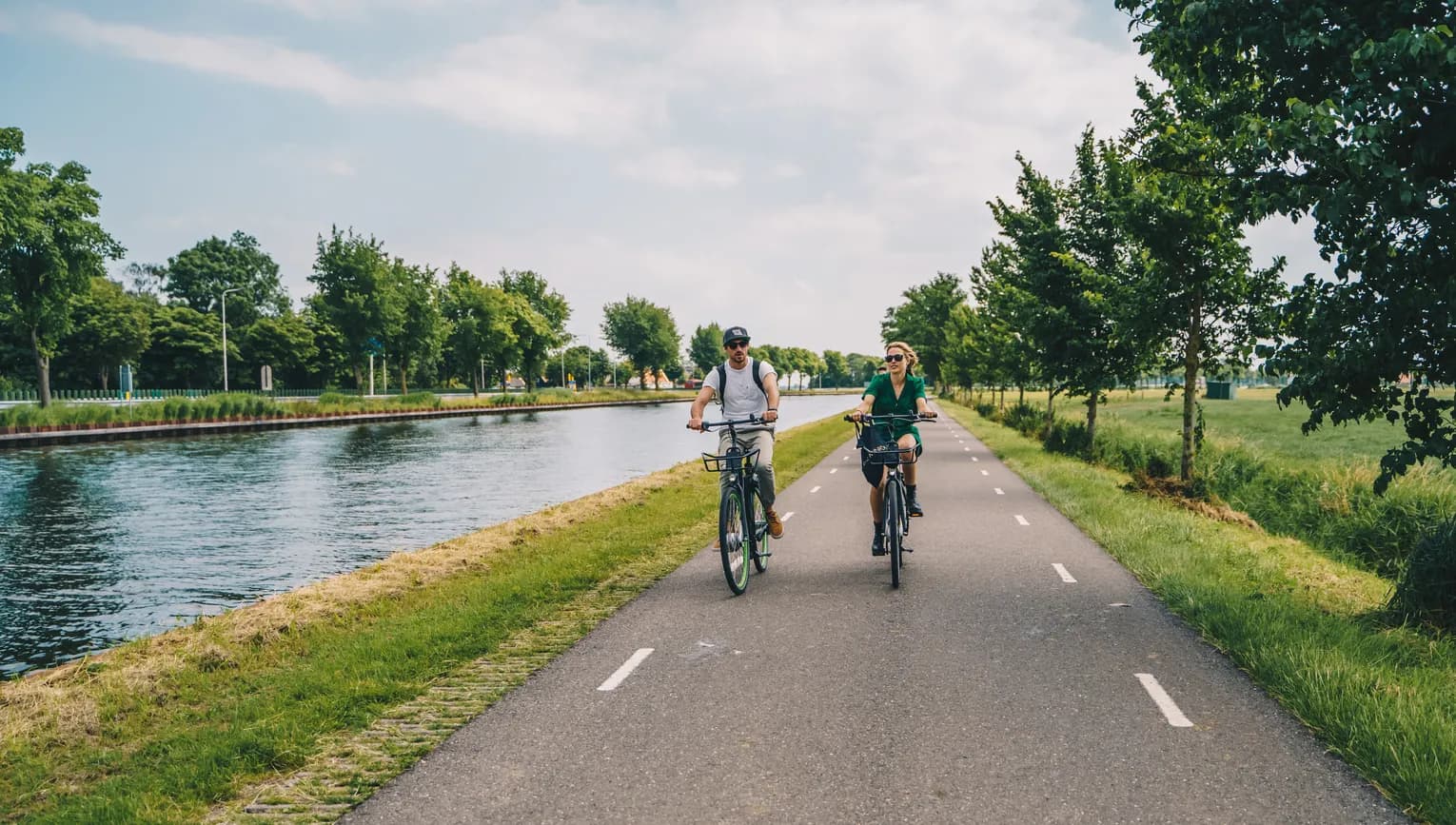 Man and woman cycling in the countryside