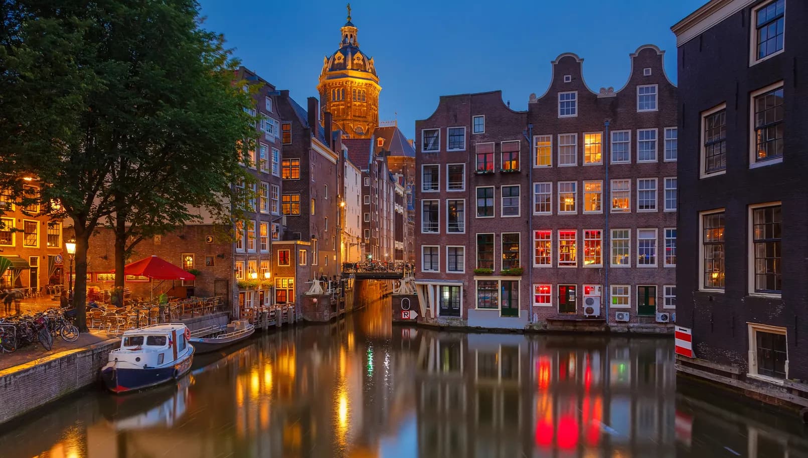 Amsterdam at night
126414503
Amsterdam Red Light District Armbrug at night with canal. Via Shutterstock