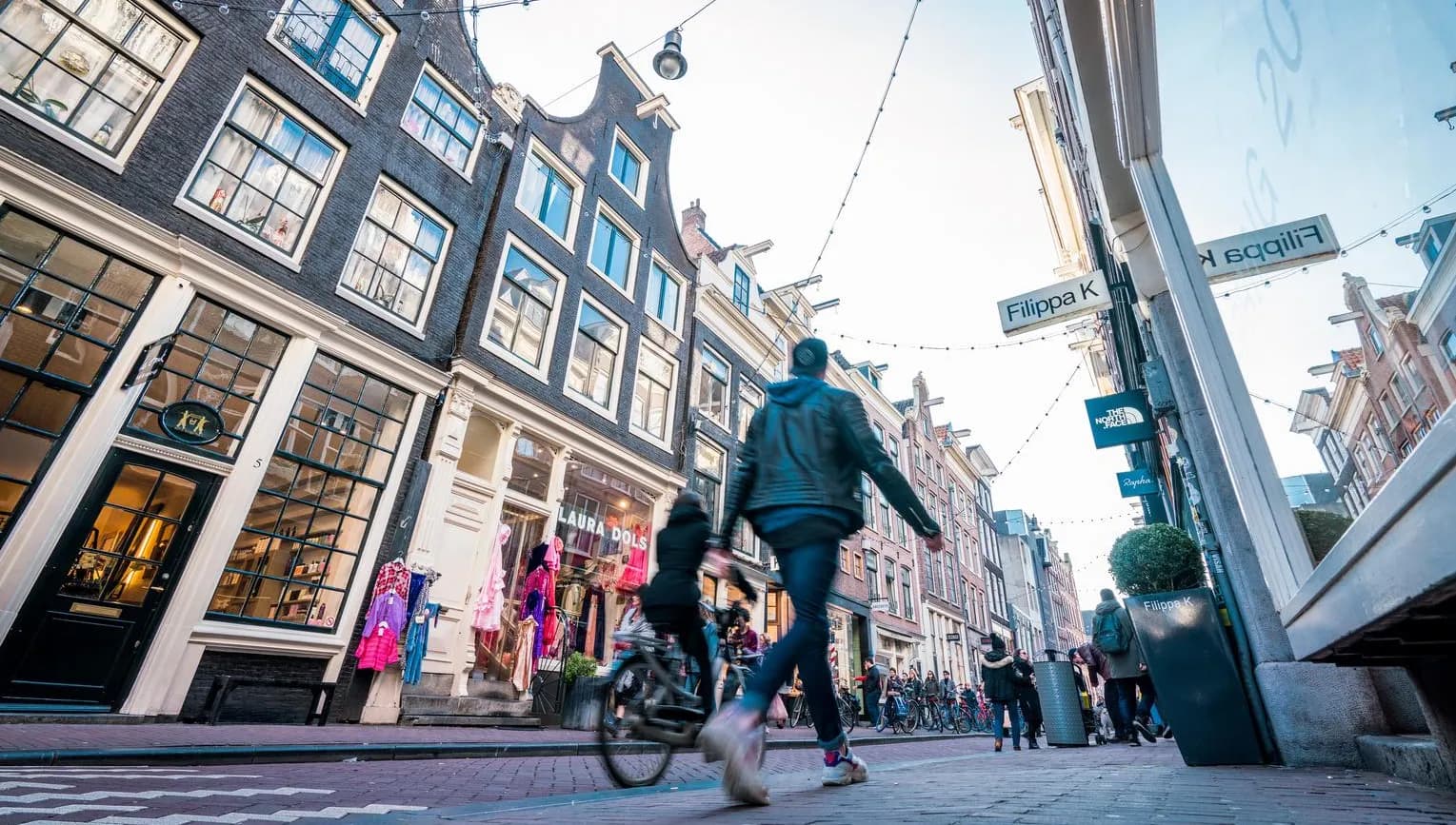 Shoppers at the Negen Straatjes shopping area.