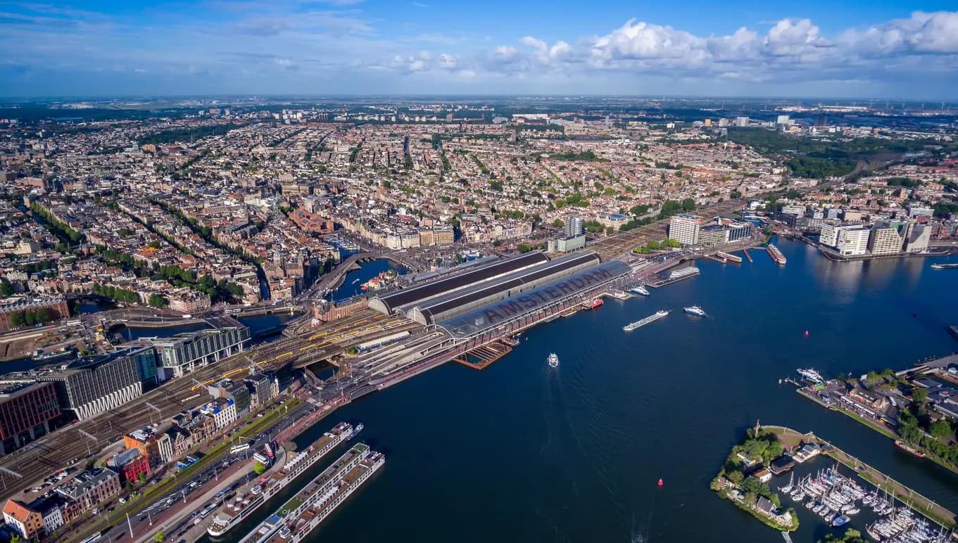 City aerial view over Amsterdam, The Netherlands. View from the bird's flight