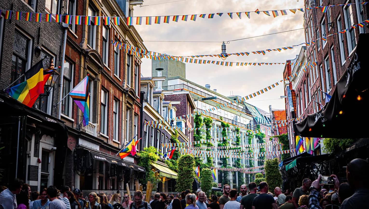 Rainbow flags hanging all over the Reguliersdwarsstraat.