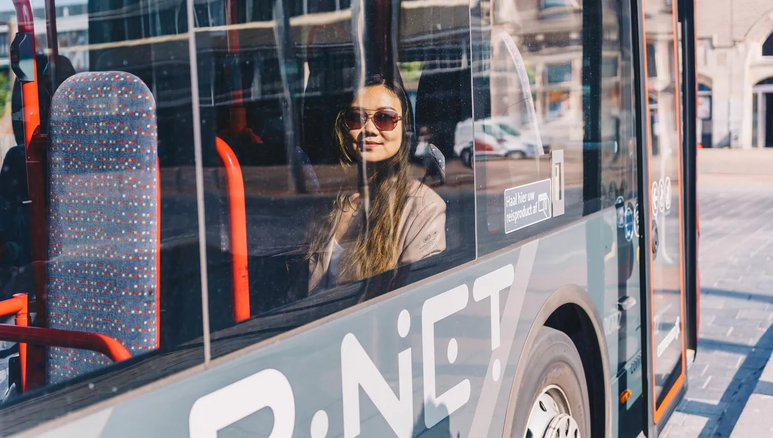 Woman in the bus near Haarlem Central Station.