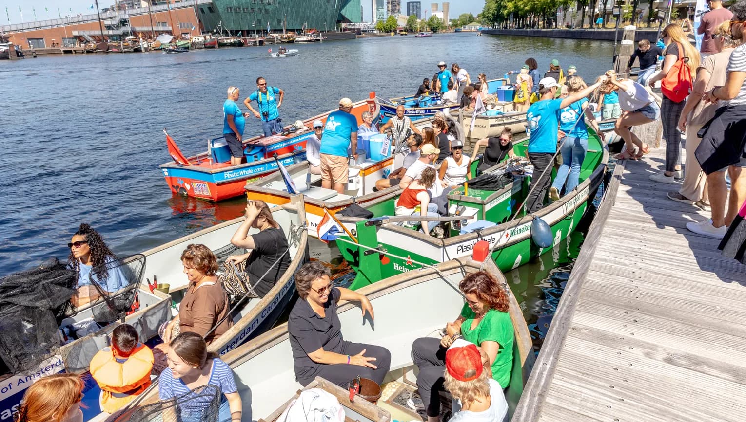 Plastic Whale boat with volunteers