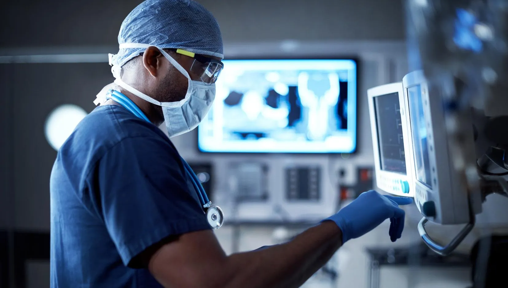 Medical professional operating medical technology in the hospital.