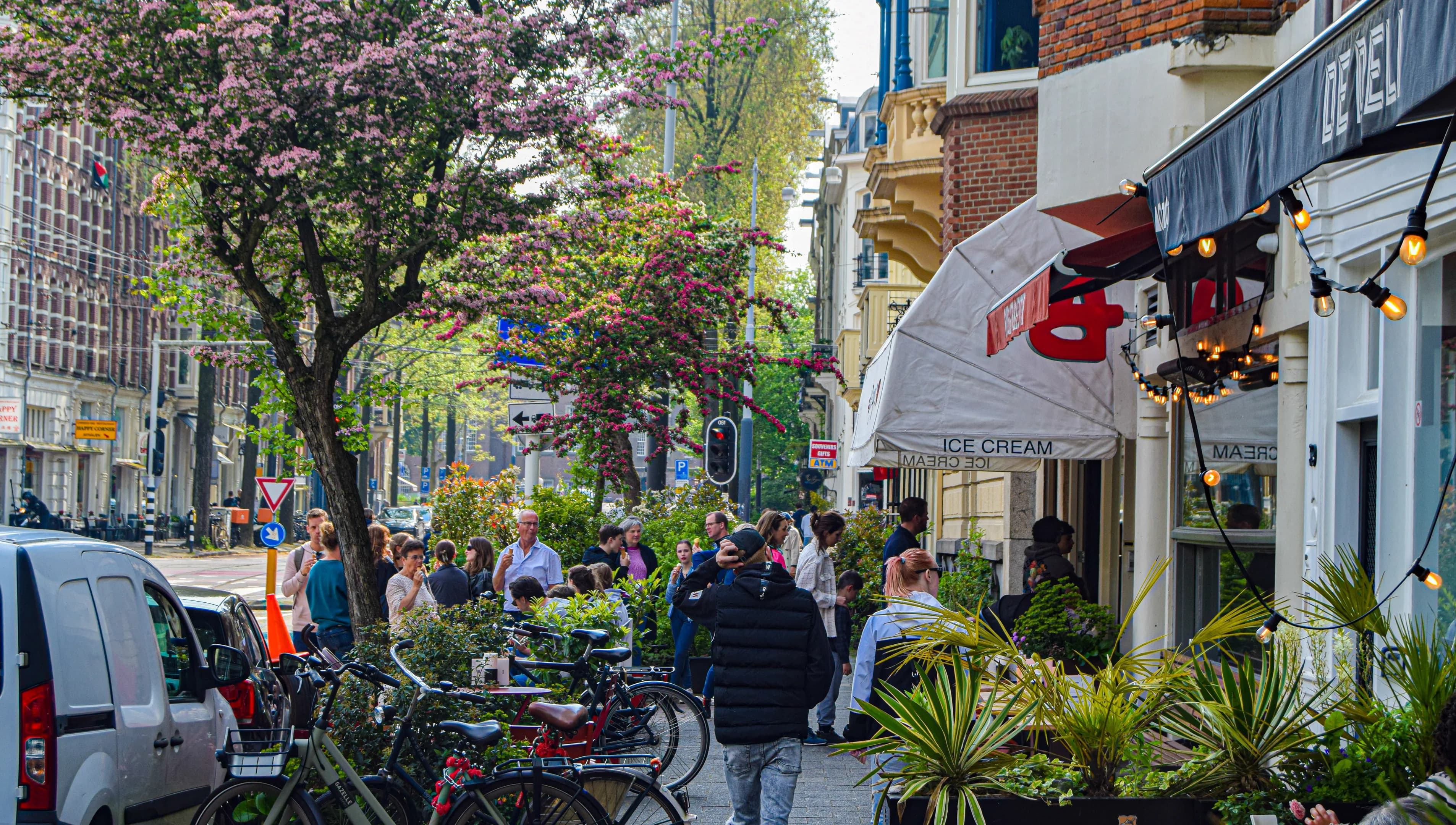 Busy street with ice cream parlour
