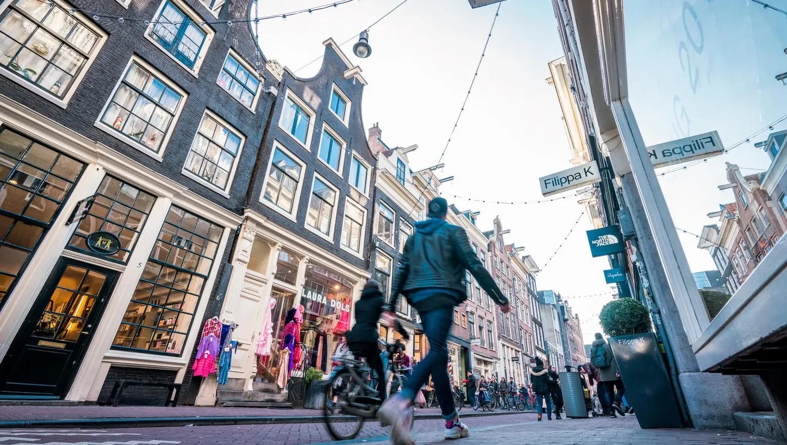Shoppers at the Negen Straatjes shopping area.