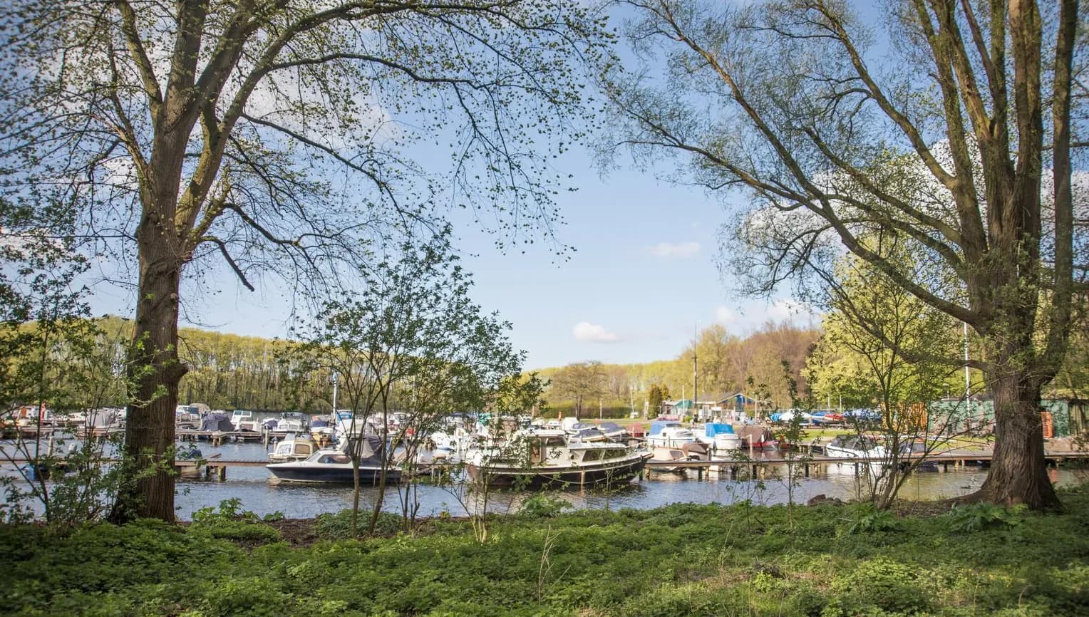 Boats on sloterplas at sloterpark harbour in spring