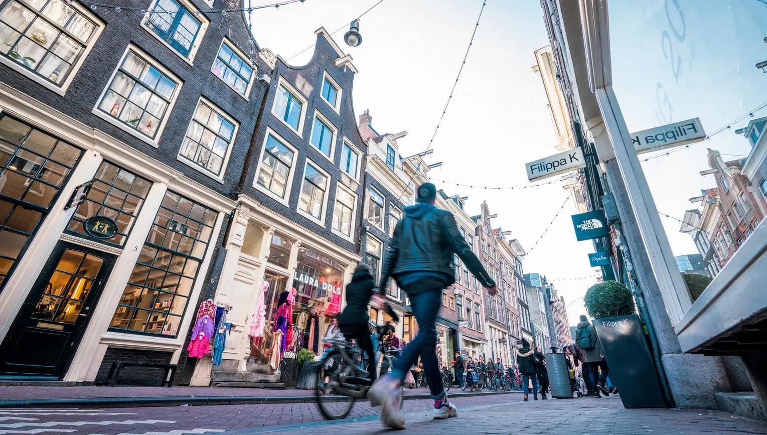 Shoppers at the Negen Straatjes shopping area.