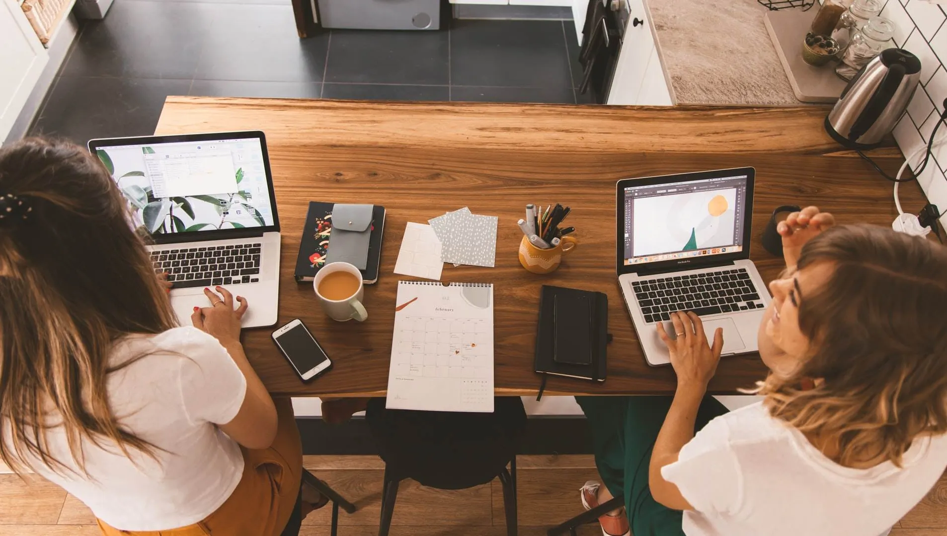 Two women working at desk