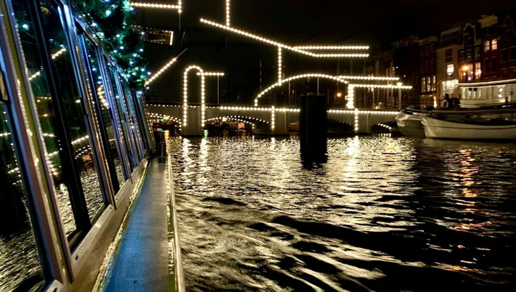 Canal view upon the lit up bridge